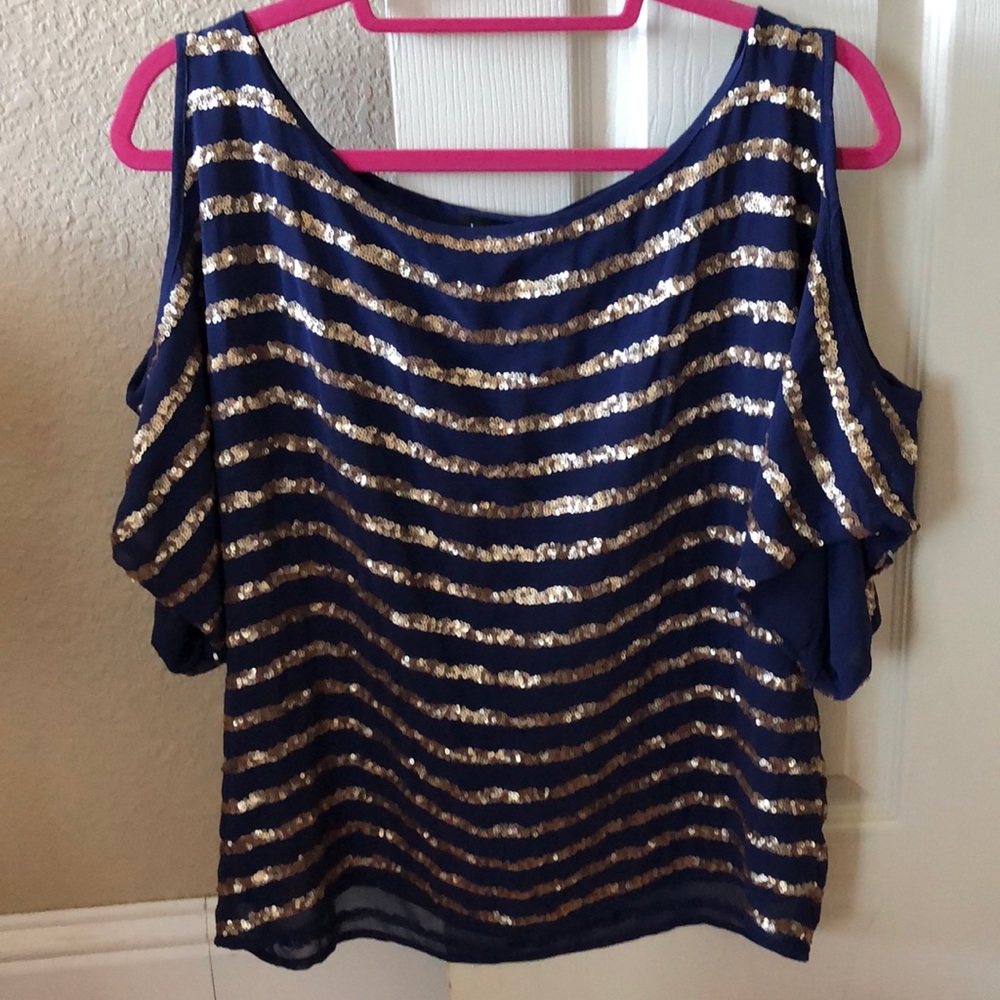 Bebe cold shoulder sequin top.
